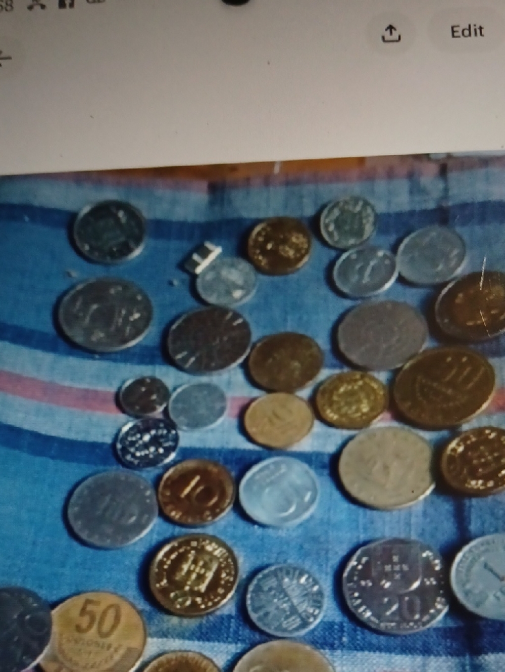 Mixed Coin Lot on Blue Striped Cloth